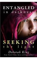 Entangled in Darkness: Seeking the Light