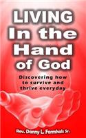 Living in the Hand of God