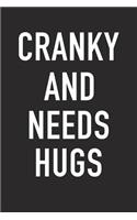 Cranky and Needs Hugs: A 6x9 Inch Matte Softcover Journal Notebook with 120 Blank Lined Pages and an Uplifting Positive Cover Slogan