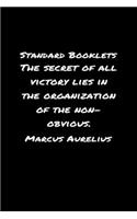 Standard Booklets The Secret of All Victory Lies in The Organization Of The Non Obvious Marcus Aurelius: A soft cover blank lined journal with a Marcus Aurelius quote at the top of each journal entry.