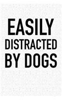 Easily Distracted by Dogs: A 6x9 Inch Matte Softcover Notebook Journal with 120 Blank Lined Pages and a Funny Animal Loving Pet Dog Owner Cover Slogan